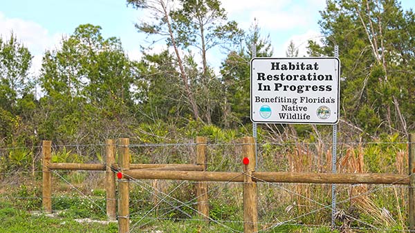 Habitat Restoration in Progess sign