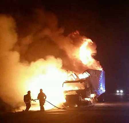 Firefighters and truck fire Firefighters and truck fire