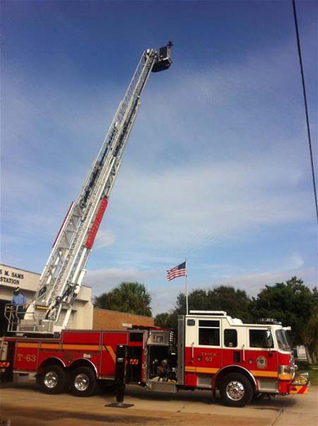Tower 63 Tower 63 has a platform that extends atop a ladder 100 feet into the air.