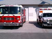 A fire truck and ambulance in front of Station 22