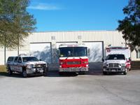 Fire truck, ambulance and fire rescue vehicle in front of Station 43