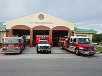 Ambulance and 2 fire trucks in front of Station 60