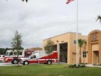 Fire truck and fire rescue vehicle in front of Station 80