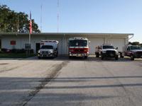 Fire truck, ambulance and fire rescue vehicle in front of Station 81
