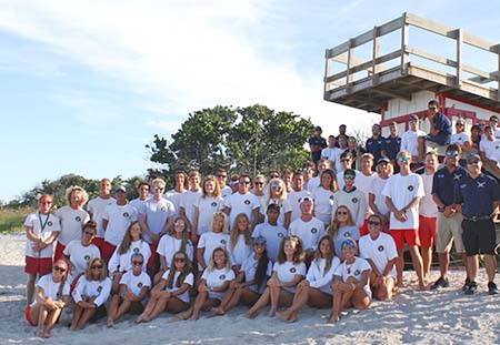 The Ocean Rescue team on the beach by one of their towers in Cocoa Beach.