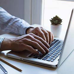 Typing on Laptop Typing on a laptop.