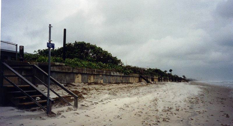 Cocoa Beach 10th Street South beach access stairway. Shoreline is only a few yards away from the sea wall.