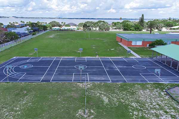 Aerial sview of basketball courts and track.