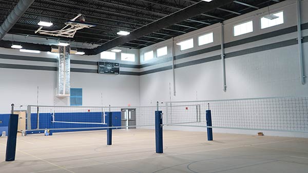 Gymnasium set up for volleyball  