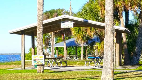 Picnic tables near the water