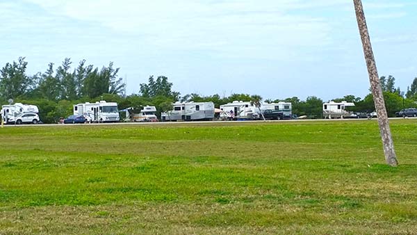 Campers near open area.