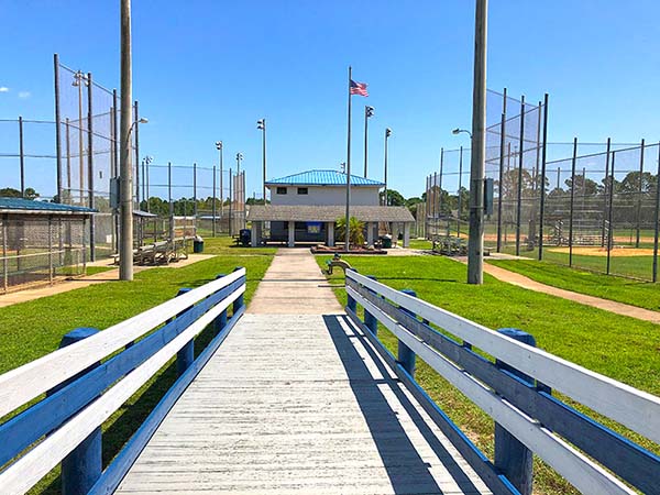 Small boardwalk leading to baseball fields