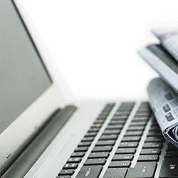 Laptop Newspapers Laptop and Newspapers
